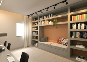 Biblioteca com cantinho para leitura e home office bem setorizado e funcional - Imagem: viviaramosarquiteta